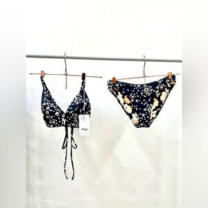 Medium Maaji women’s reversible bikini top and bottom.